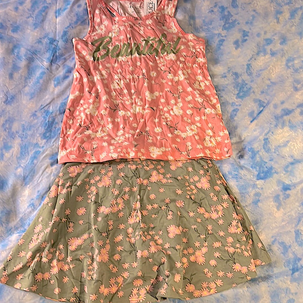 Matching set of green, pink, and white tank top and shirt